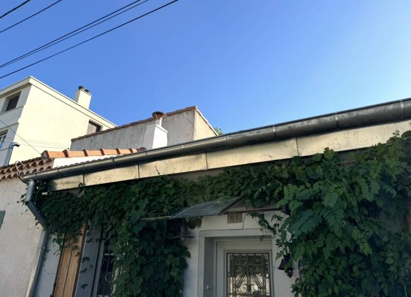 Pose d’une gouttière en 33